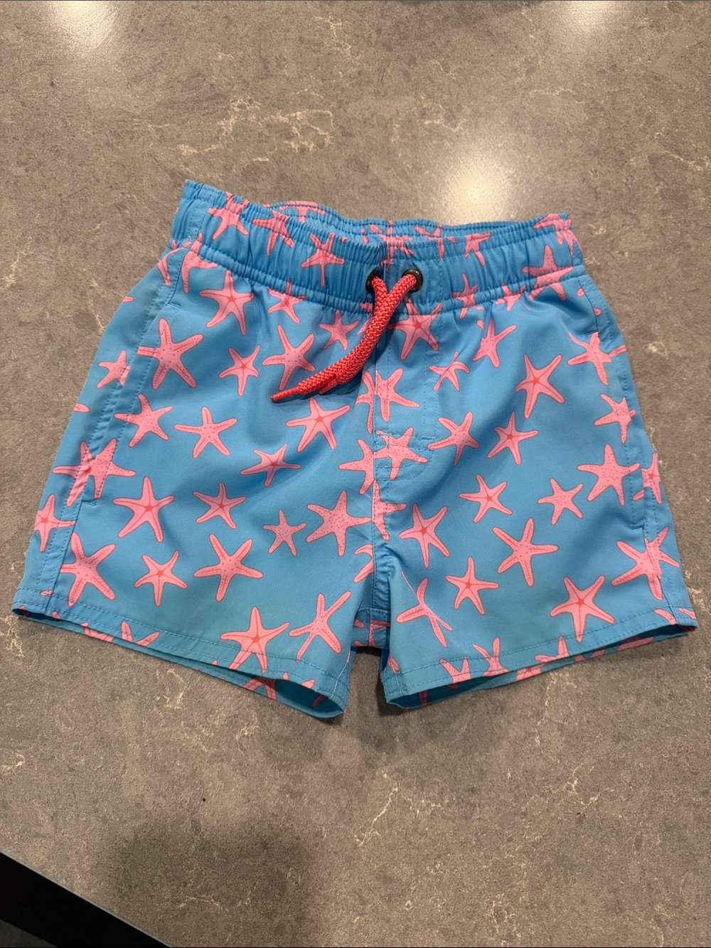 Kids Blue Swim Shorts with Pink Starfish Print
